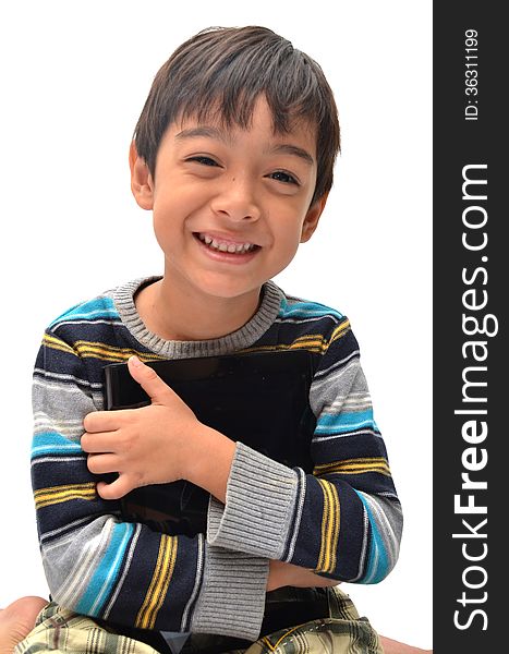 Happy little boy with tablet on white background