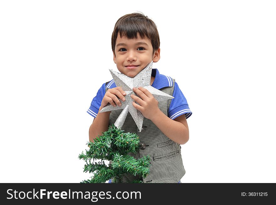 Little boy holding star christmas tree on white background