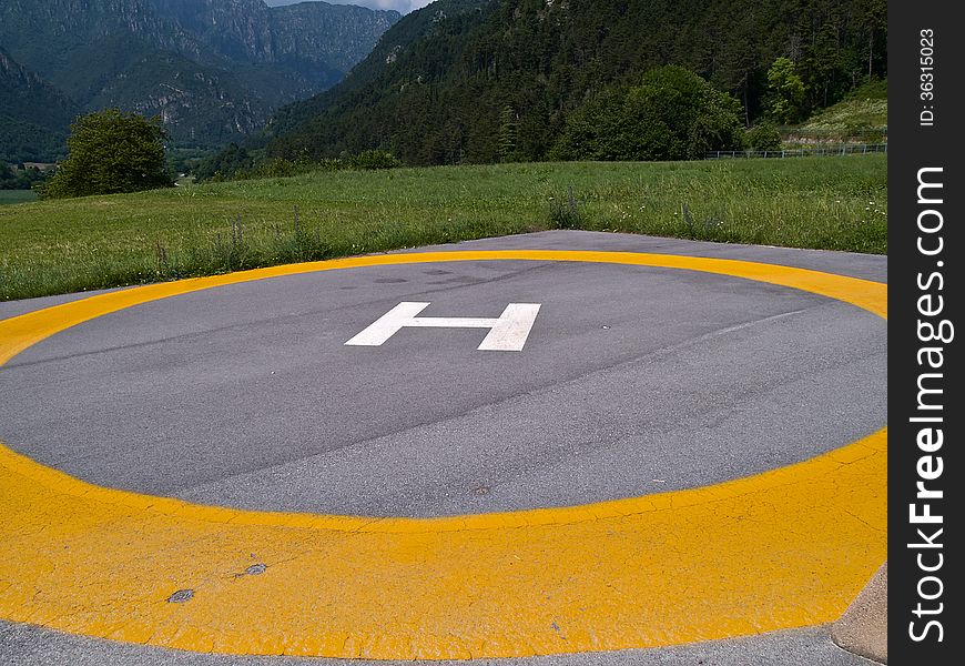 Helicopter landing pad helipad high up in the Alps