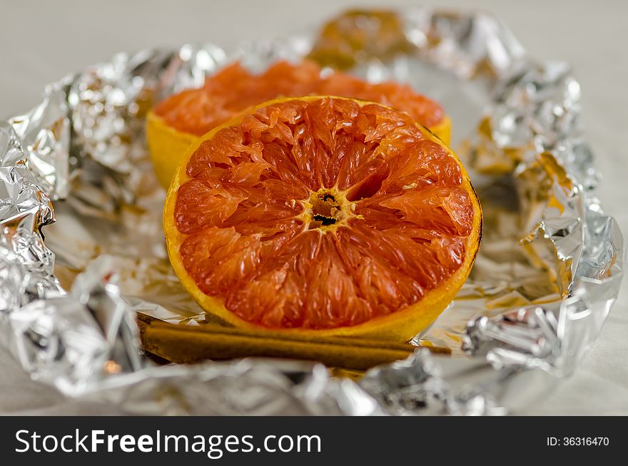 Baked grapefruit in alluminum foil paper.