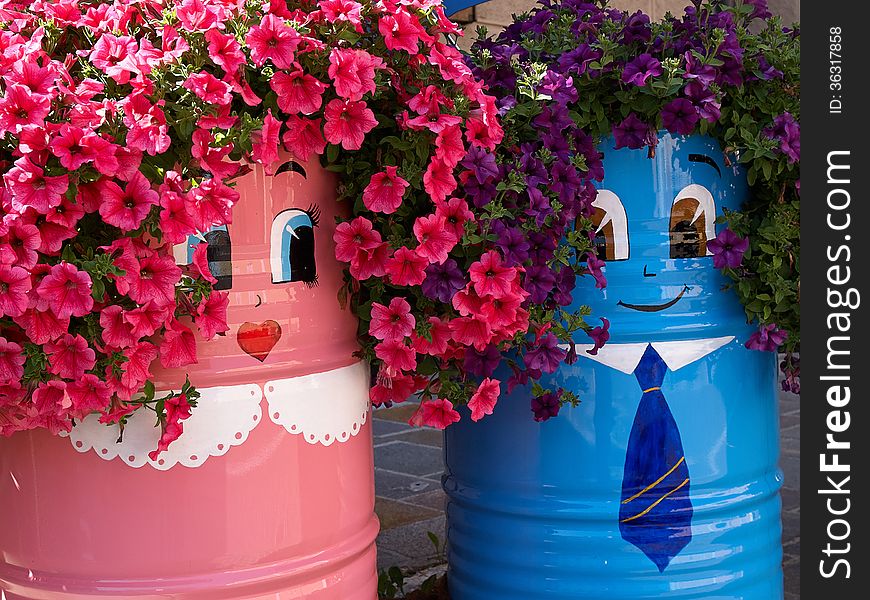 Creative funny beautiful street flower pots Italy. Creative funny beautiful street flower pots Italy