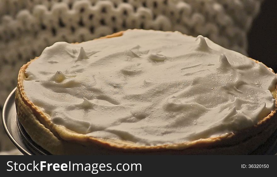 Using a blow torch to caramelize meringue