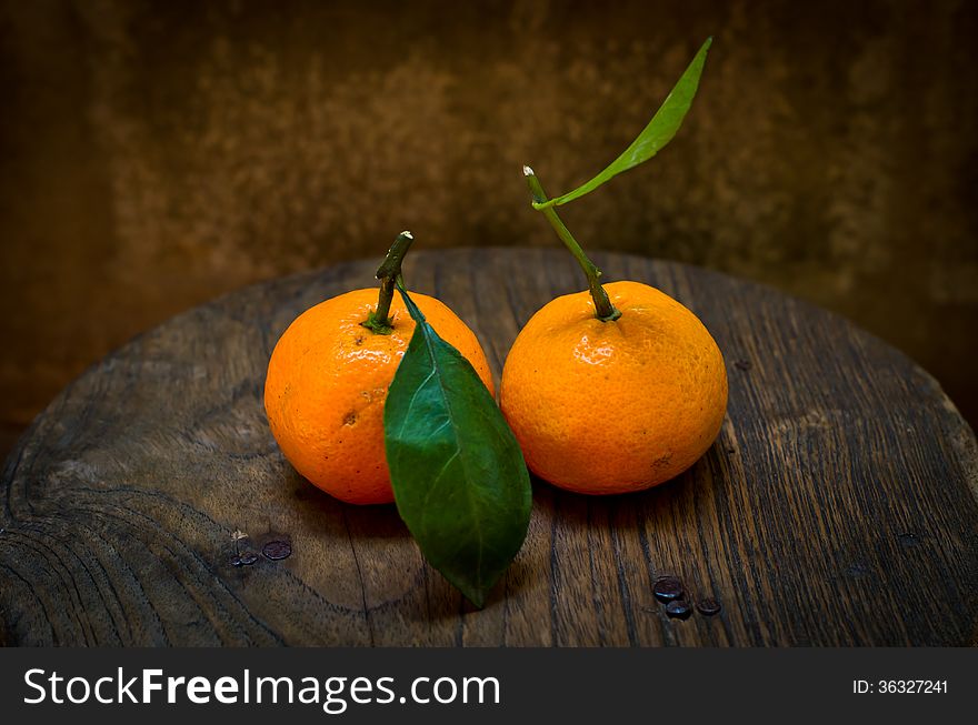 Fresh orange on an old chair,still life. Fresh orange on an old chair,still life