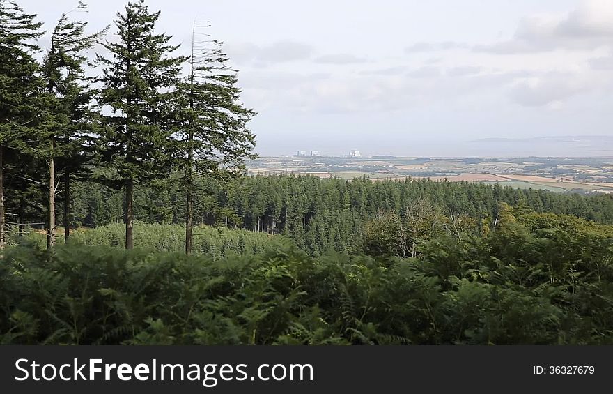 View from the Quantock Hills Somerset England views towards Hinkley Point Nuclear Power station and Bristol Channel. View from the Quantock Hills Somerset England views towards Hinkley Point Nuclear Power station and Bristol Channel