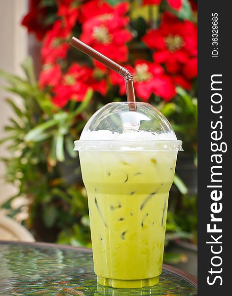 Cold milk greea tea at coffee shop. Cold milk greea tea at coffee shop