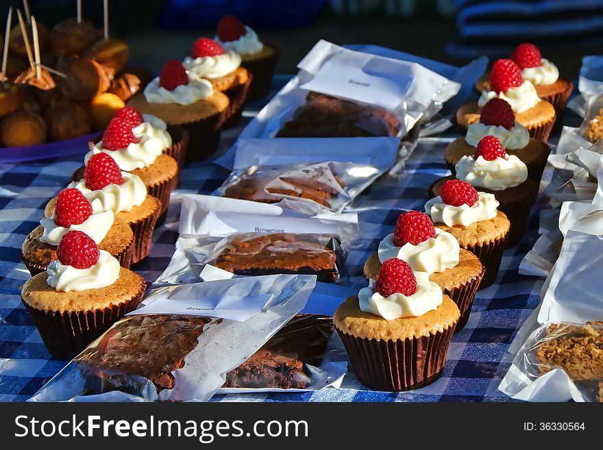 A selection of cakes for sale at a local market. A selection of cakes for sale at a local market.