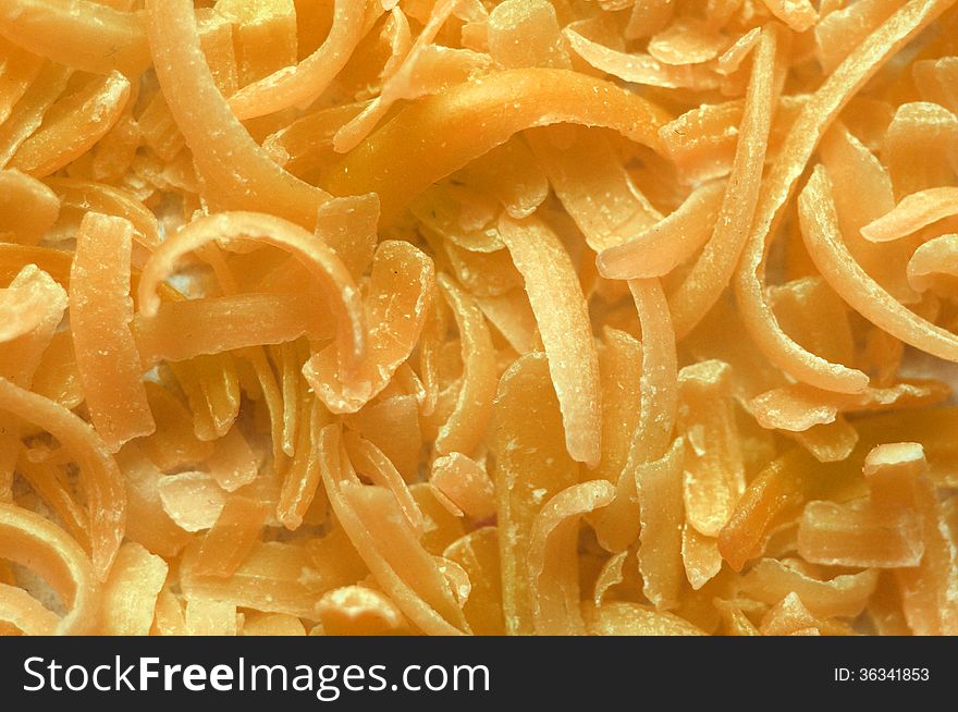 Closeup of orange soap scraps background. Closeup of orange soap scraps background