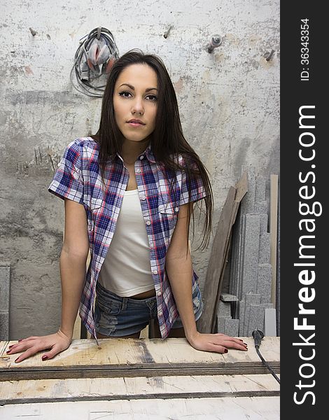 Beautiful young model posing as a worker. Beautiful young model posing as a worker