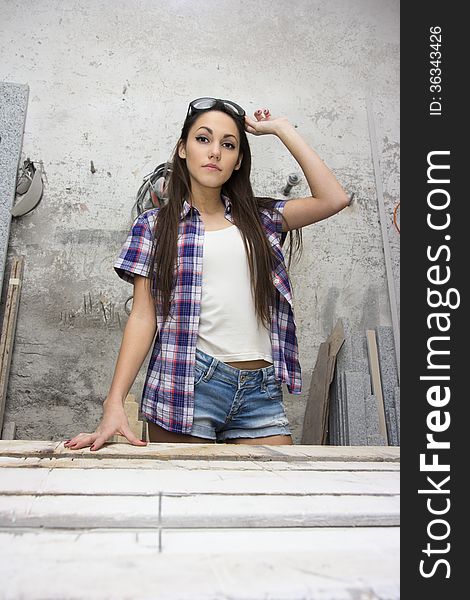Beautiful young model posing as a worker. Beautiful young model posing as a worker
