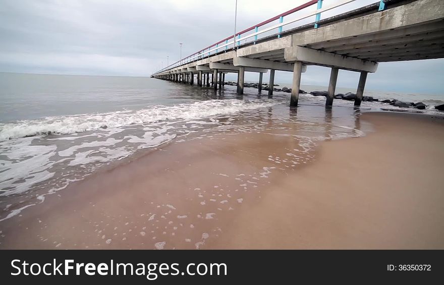 The Baltic Sea waves and a pier in Palanga, Lithuania. The Baltic Sea waves and a pier in Palanga, Lithuania