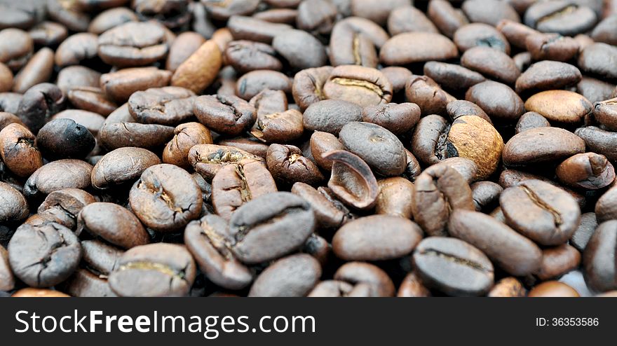 Coffee on grunge wooden background, coffee beans