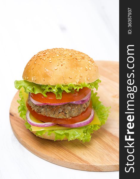 Burger With A Vegetarian Cutlet And Fresh Vegetables