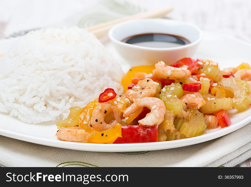 Chinese food, white rice and vegetables with shrimp, close-up