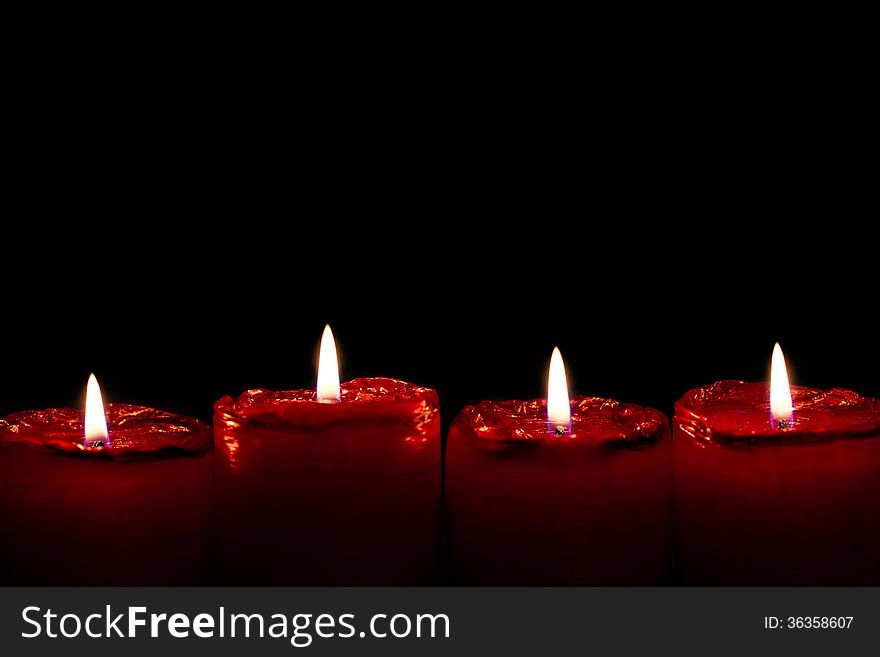 Detailed photo of red advent candles.