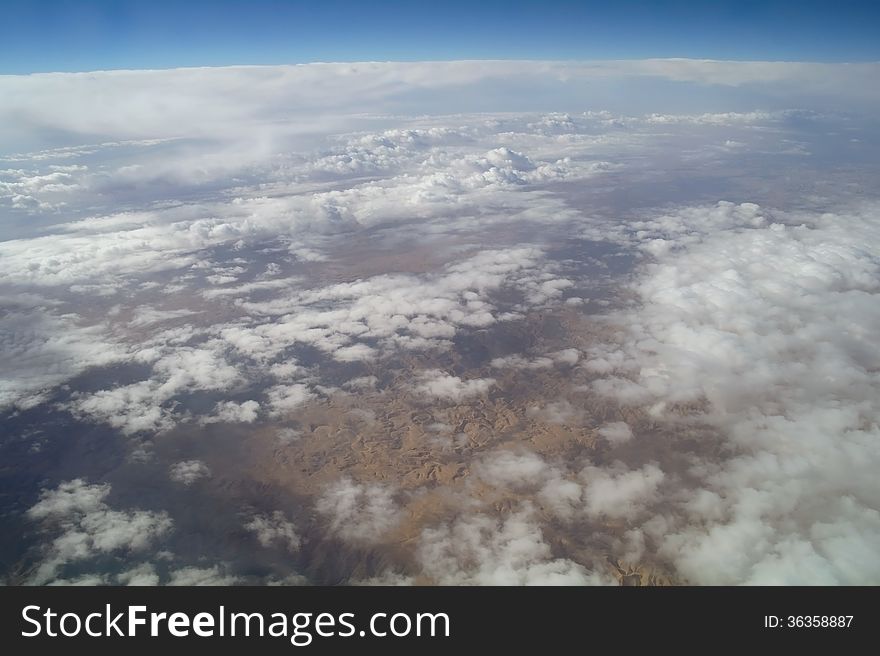 Sky view of cloudscape and earth. Sky view of cloudscape and earth