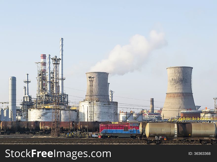 Oil tankers waiting to be loaded at an oil and gas refinery. Oil tankers waiting to be loaded at an oil and gas refinery