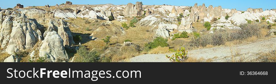 Warm Glow of Sunset on the Fairy Chimneys of Cappadocia, Popular Travel Destination in Central Turkey. Warm Glow of Sunset on the Fairy Chimneys of Cappadocia, Popular Travel Destination in Central Turkey