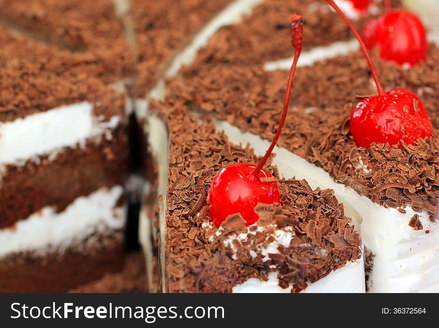 Cake With Chocolate And Cherry On Top