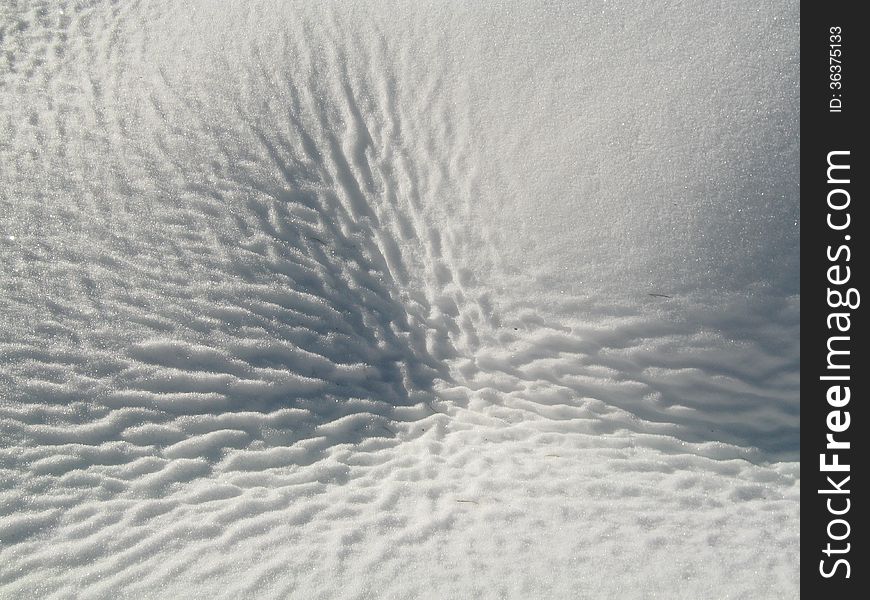 Ripples in the snow in a winter landscape