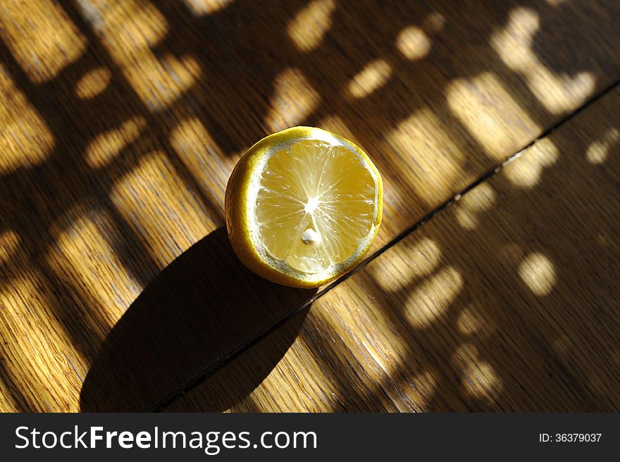Lemon on the table with interesting lighting