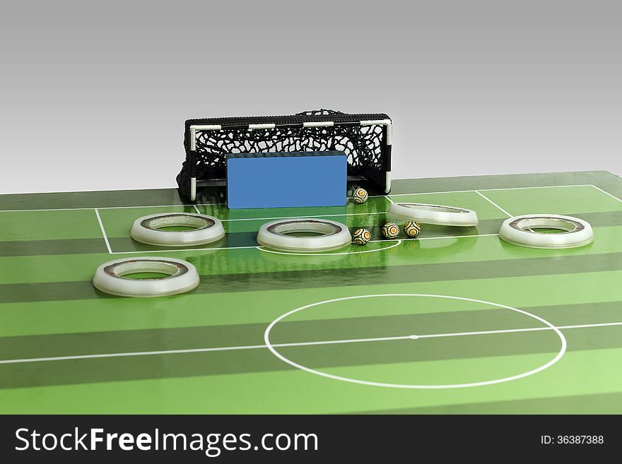 Button soccer players and goalkeeper. Button soccer players and goalkeeper