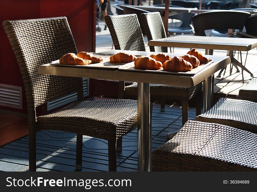 Croissant breakfast in the restaurant outside. Croissant breakfast in the restaurant outside