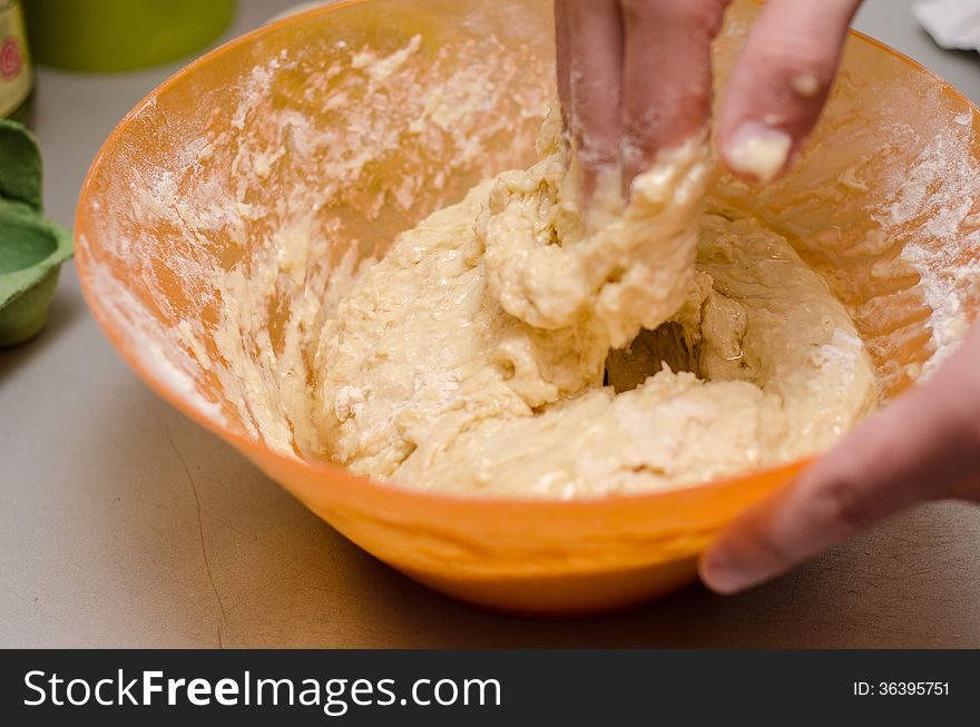 Hand kneading cinnamon bread dough. Hand kneading cinnamon bread dough