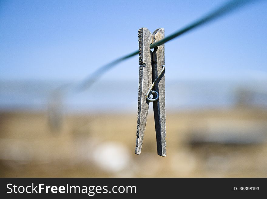 Clothes pin on a line with very shallow depth