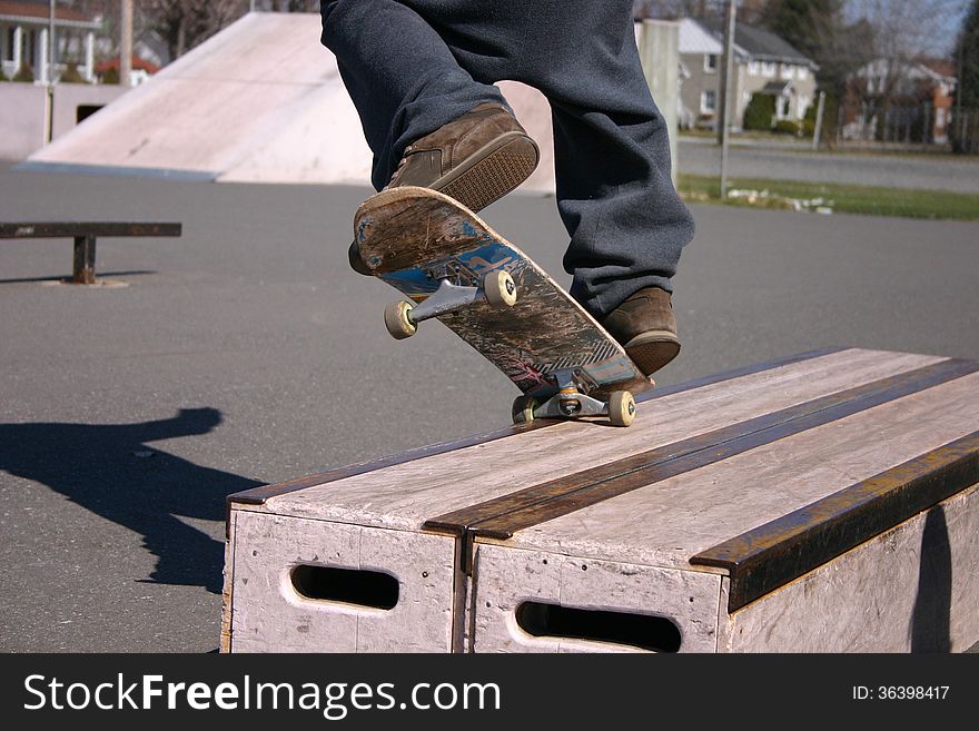 Skateboard grind closeup on feet