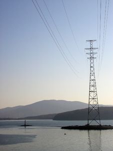 Lighthouse And Power Transmission Tower Stock Photo Lighthouse And Power Transmission Tower Stock Photo