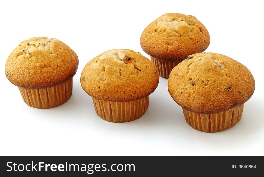 Muffins with chocolate filling isolated on white background
