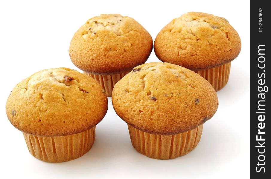 Muffins with chocolate filling isolated on white background