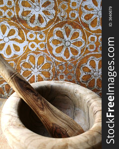 Wooden mortar with brown and white ornament background ,