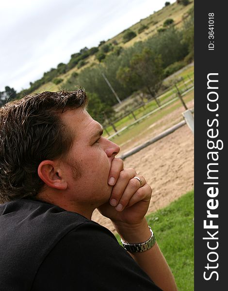 Profile of a young male looking into the distance