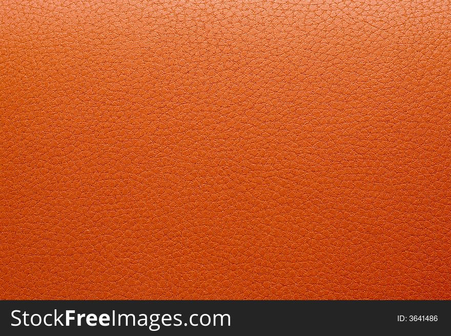 Brownish-reddish artificial leather texture