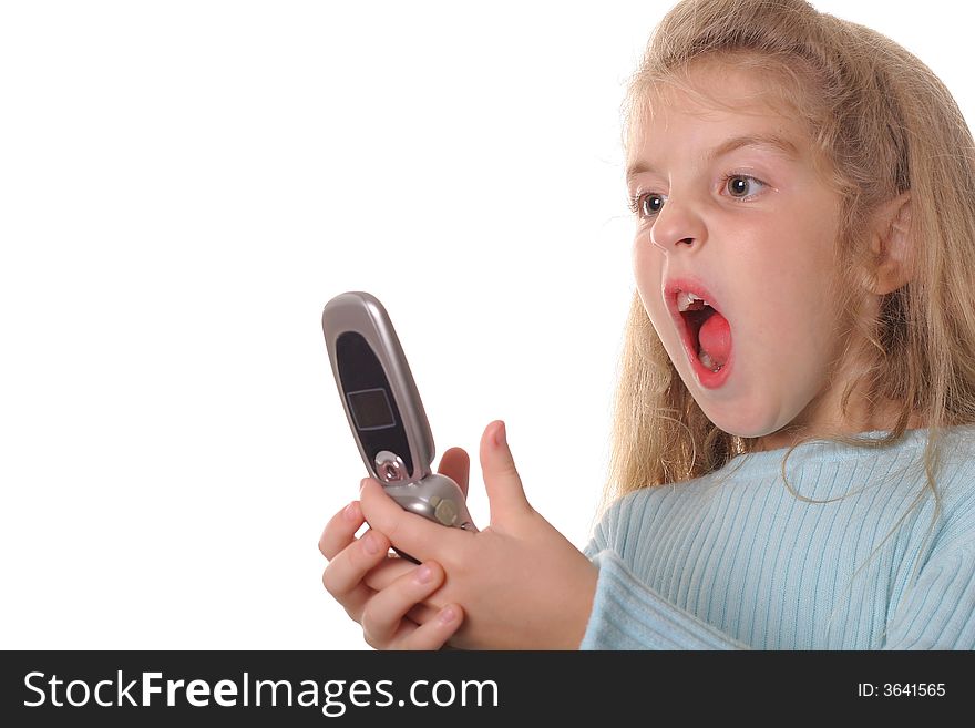 Shot of an angry little girl screaming on cellphone