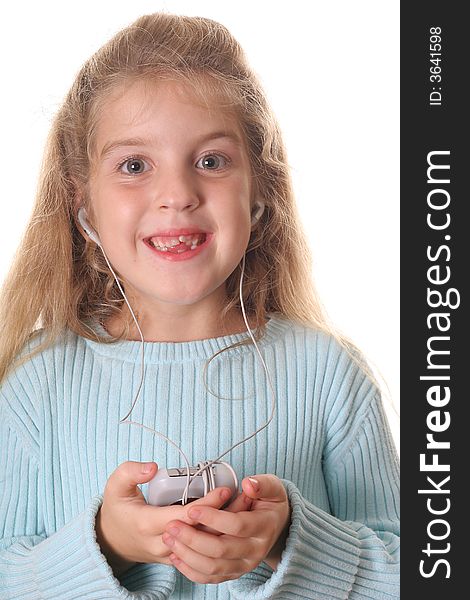 Little girl listening to music