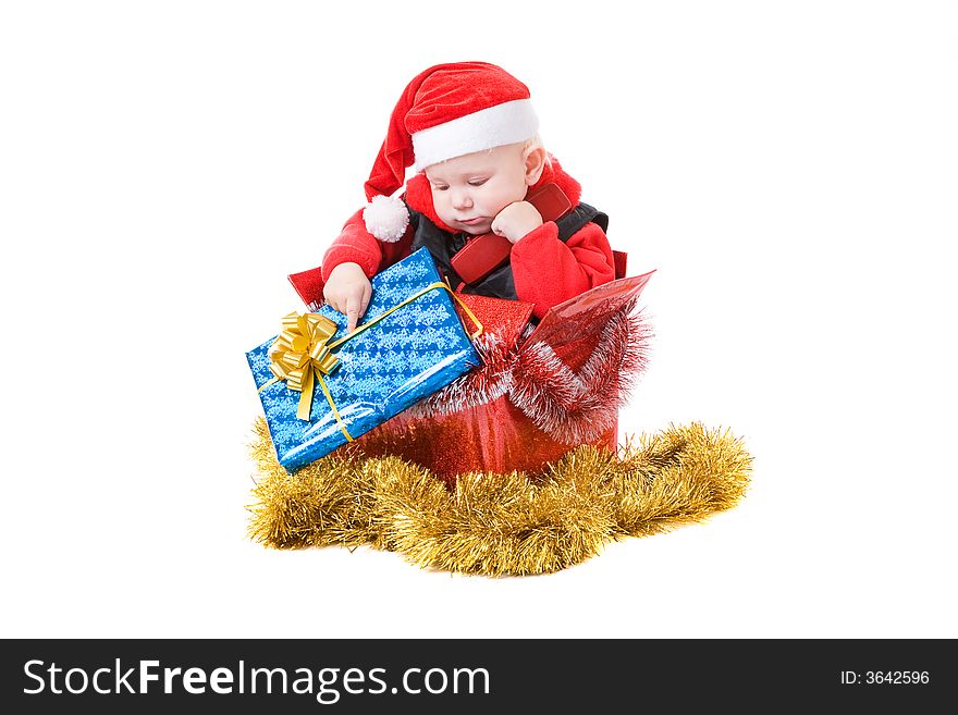 Infant calling by phone in the decorated christmas box. Infant calling by phone in the decorated christmas box