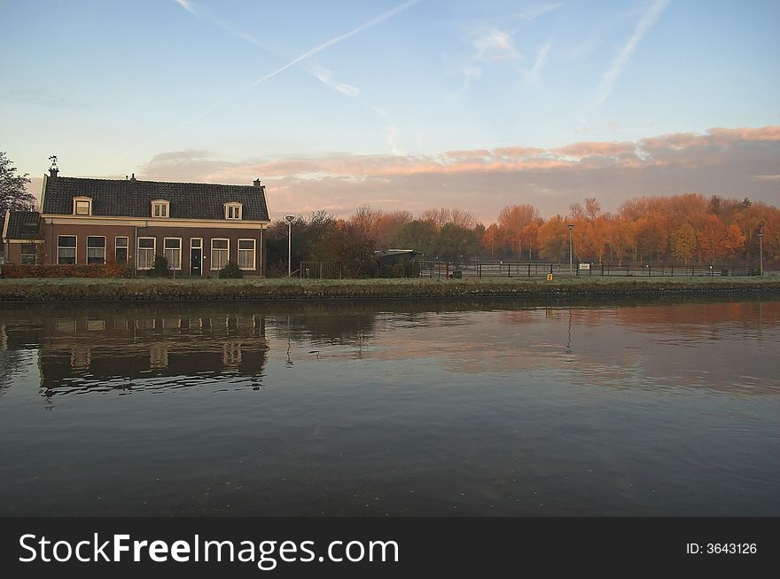 Canal road in Delft, Holland, photographed on a winter frosty morning in autumn