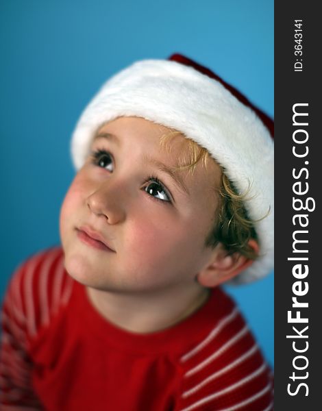 Young boy in a santa hat