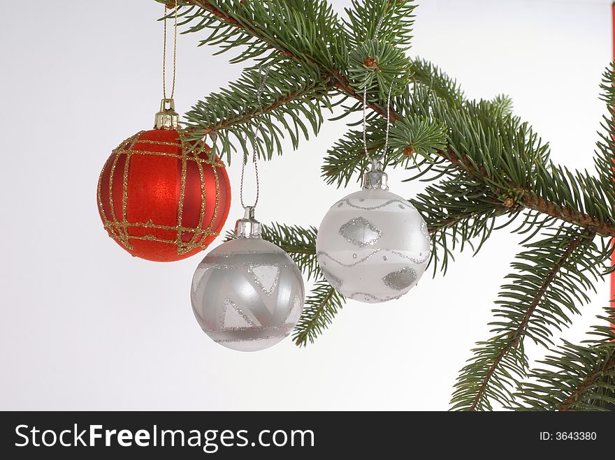 A christmastree with red and silver ball. A christmastree with red and silver ball