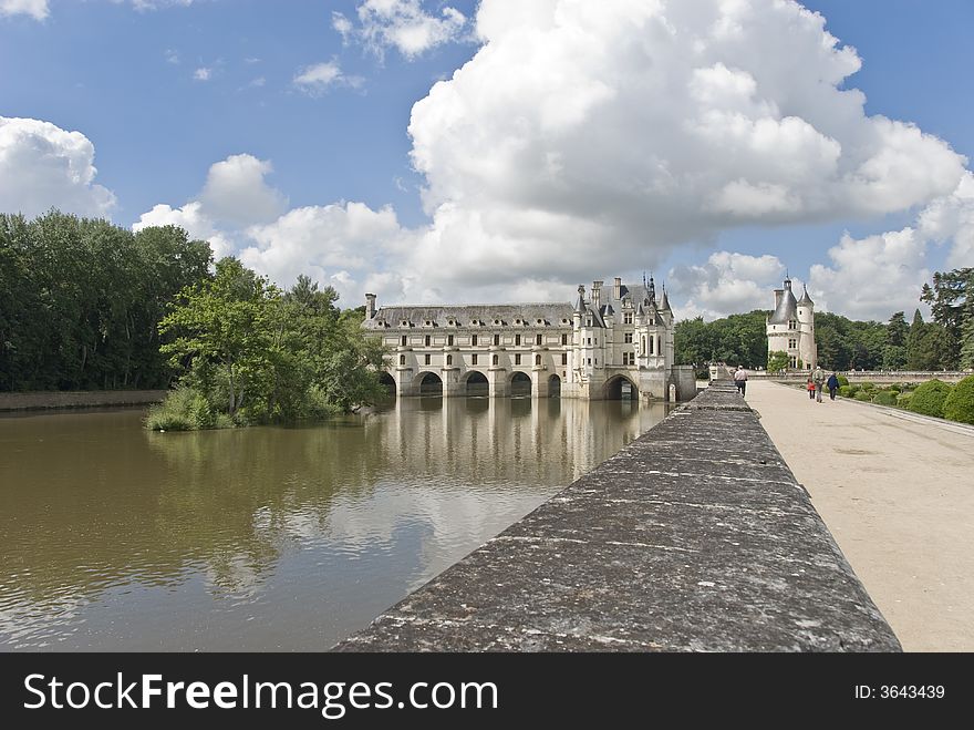 Famous castle Chenonceau, view along the river. Loire Valley, France. Famous castle Chenonceau, view along the river. Loire Valley, France.