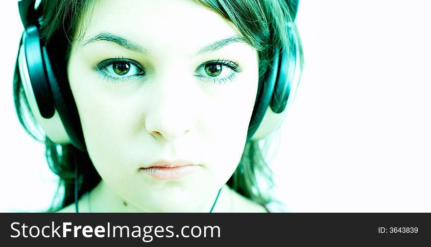 High-Key portrait of a Girl with headphones. High-Key portrait of a Girl with headphones