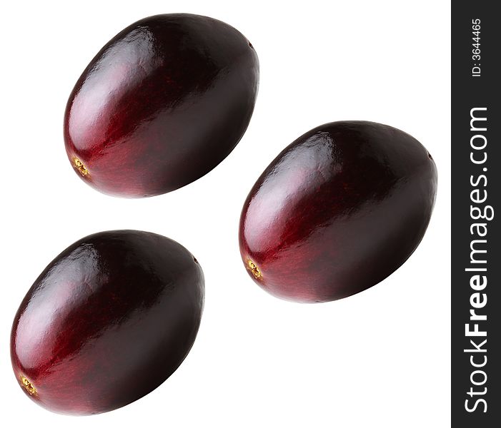 Three red fresh shining grapes form a funny face. Three red fresh shining grapes form a funny face.