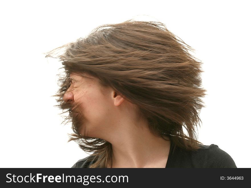 Young woman isolated over white background, with messy hair