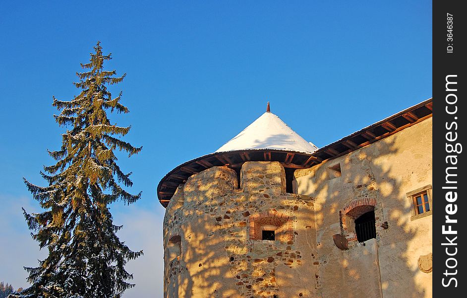 View on a tower of the castle in a clear winter day