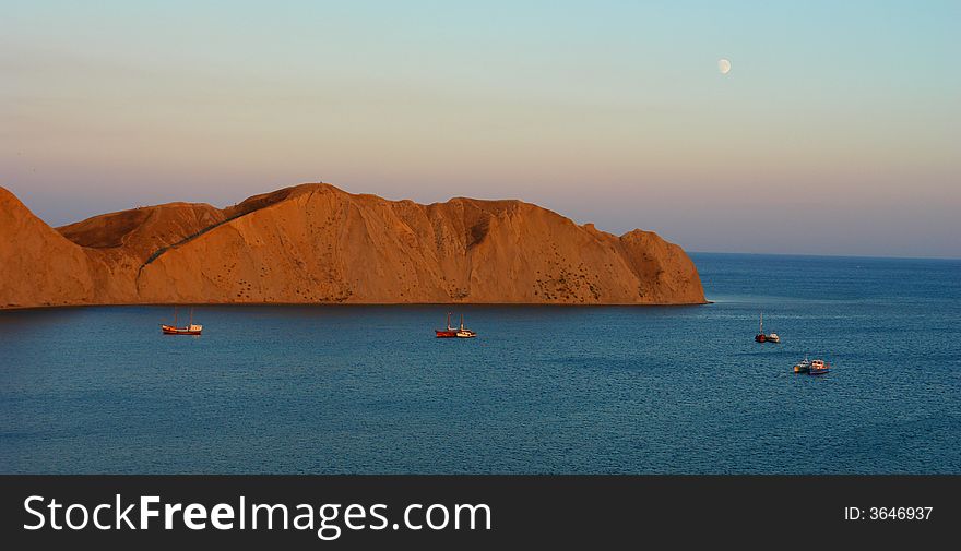 Boat on a background of mountains