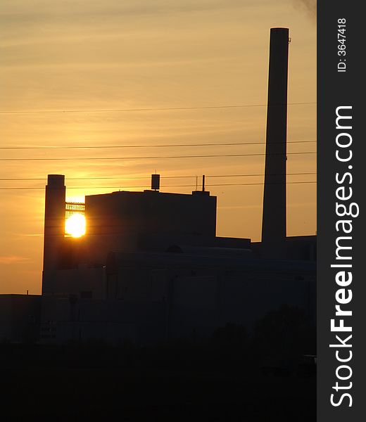 A view at a power station at sunset. A view at a power station at sunset.