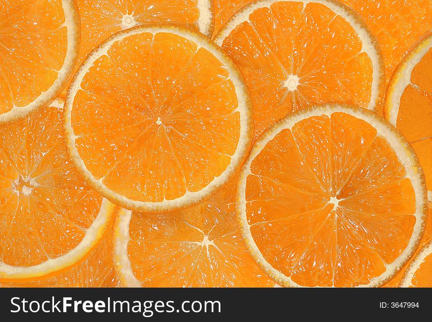 Oranges. Fresh pieces of an orange.