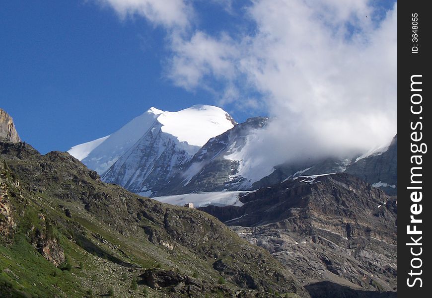 Picture of the Bishorn in switzerland with the turtmannhÃ¼tte before it. Picture of the Bishorn in switzerland with the turtmannhÃ¼tte before it.